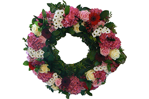 Blommor till begravning Nykvarn - Beställ blommor till begravning - krans till begravning rosa rött och vitt